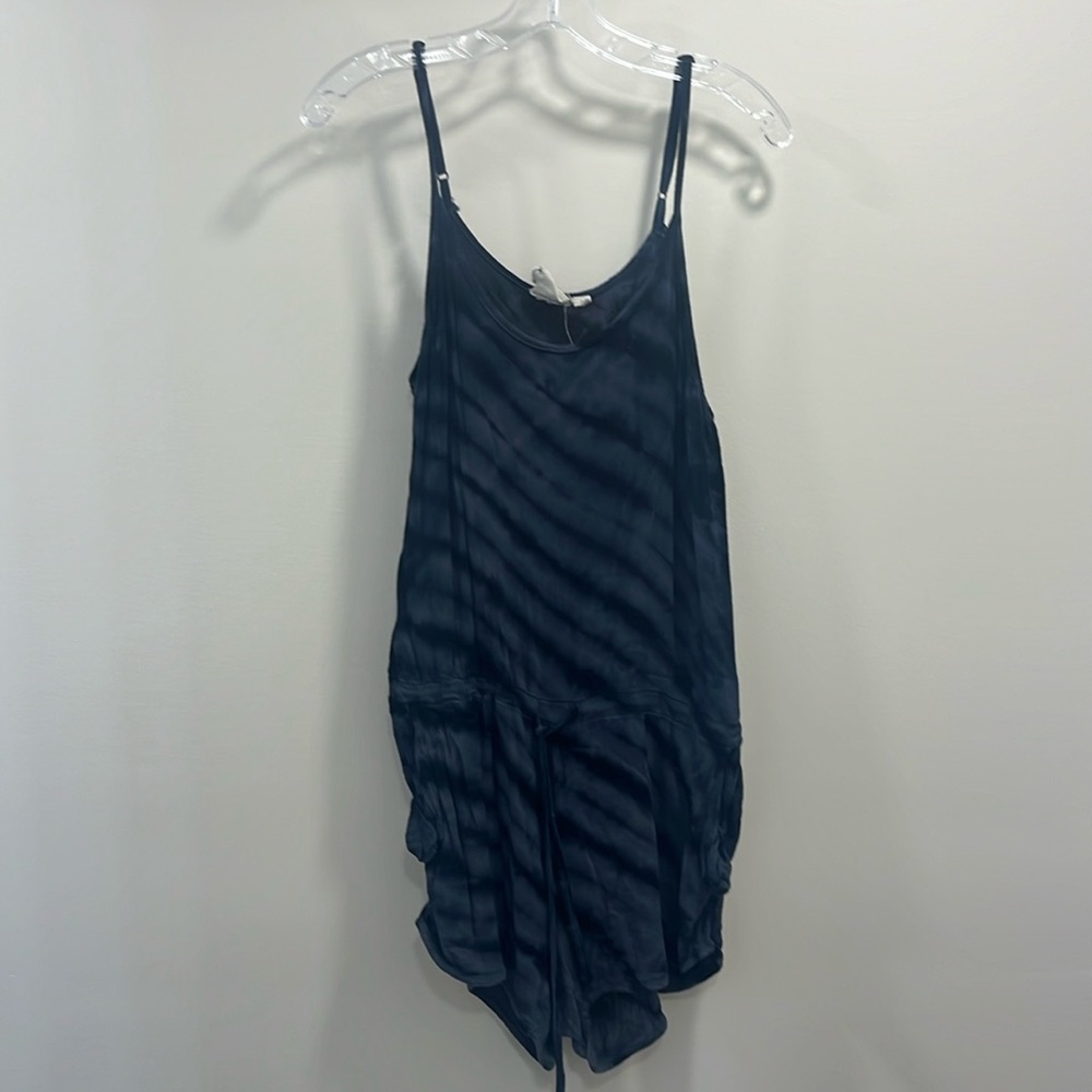 Women’s romper with pockets and tie at waist